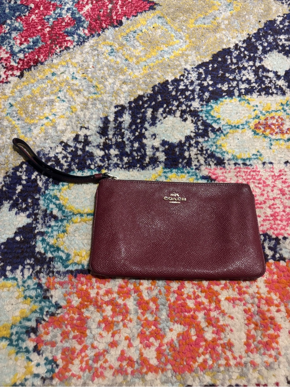 Coach Pebbled Leather Wristlet in Wine